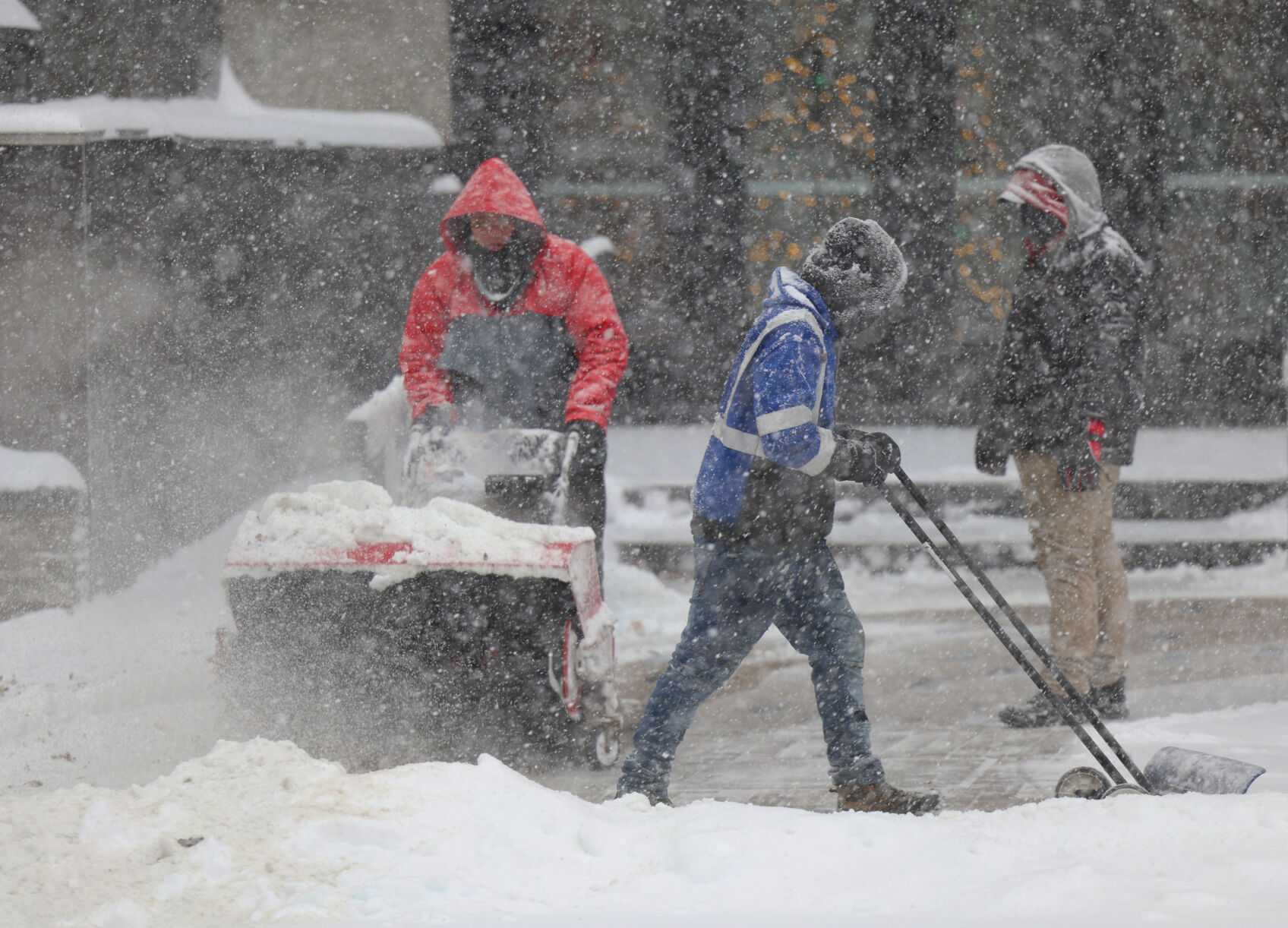Workers shovel snow - Jan. 5, 2025.JPG